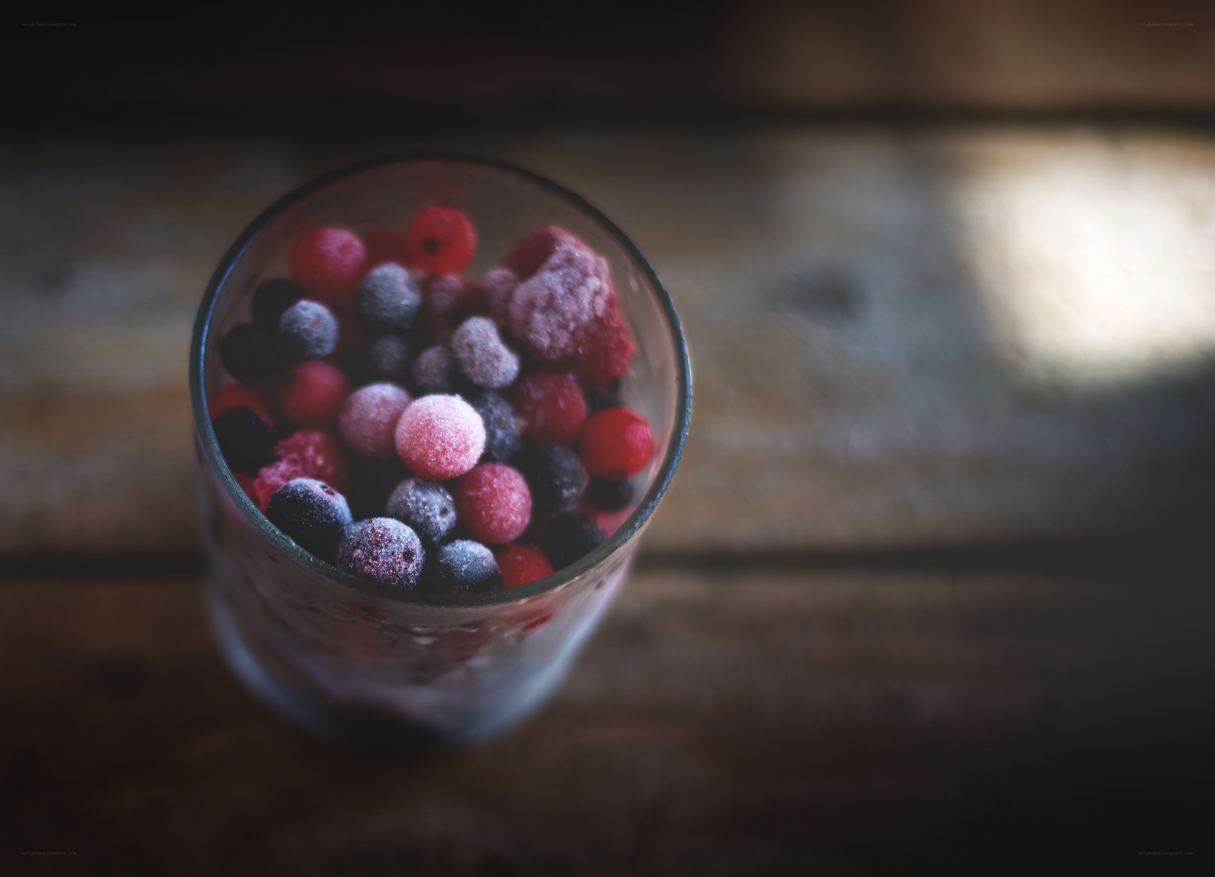 frozen berries in a glass