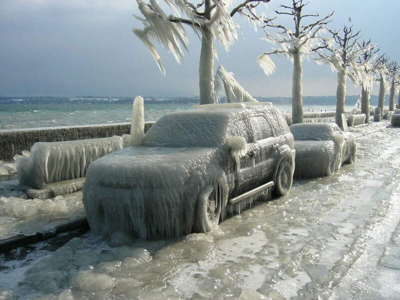 Frozen cars by the lake