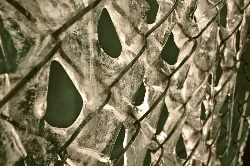frozen chain-link fence