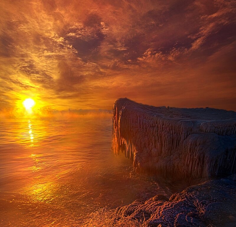 Frozen Cliff at Sunset — Orange