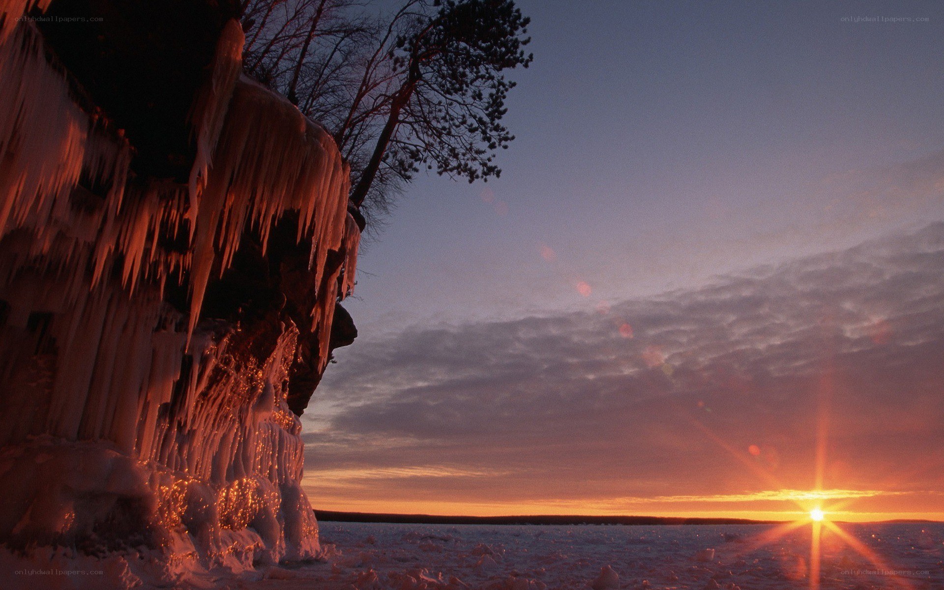 Frozen cliff at sunset