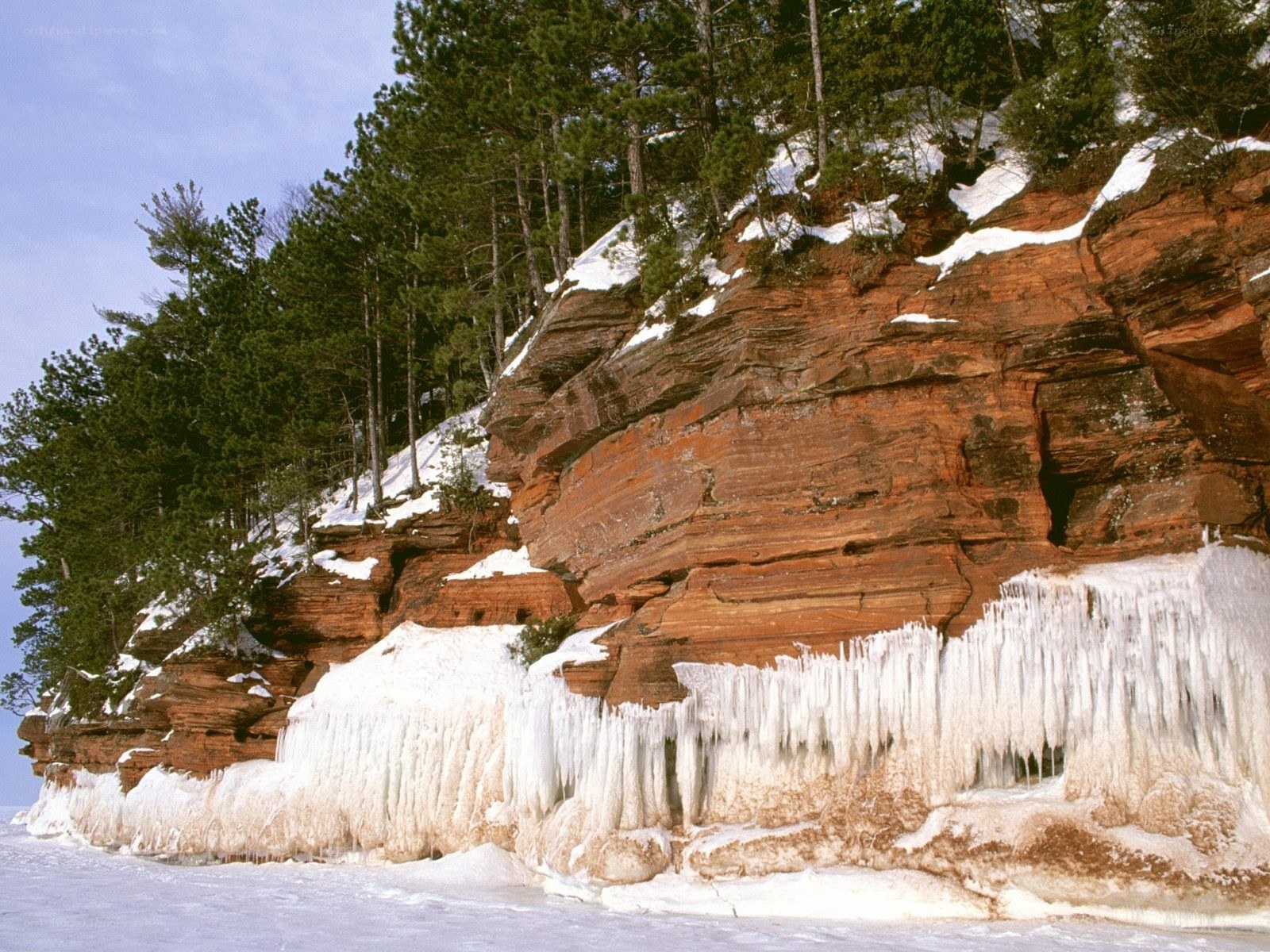 Frozen cliffs with icicles