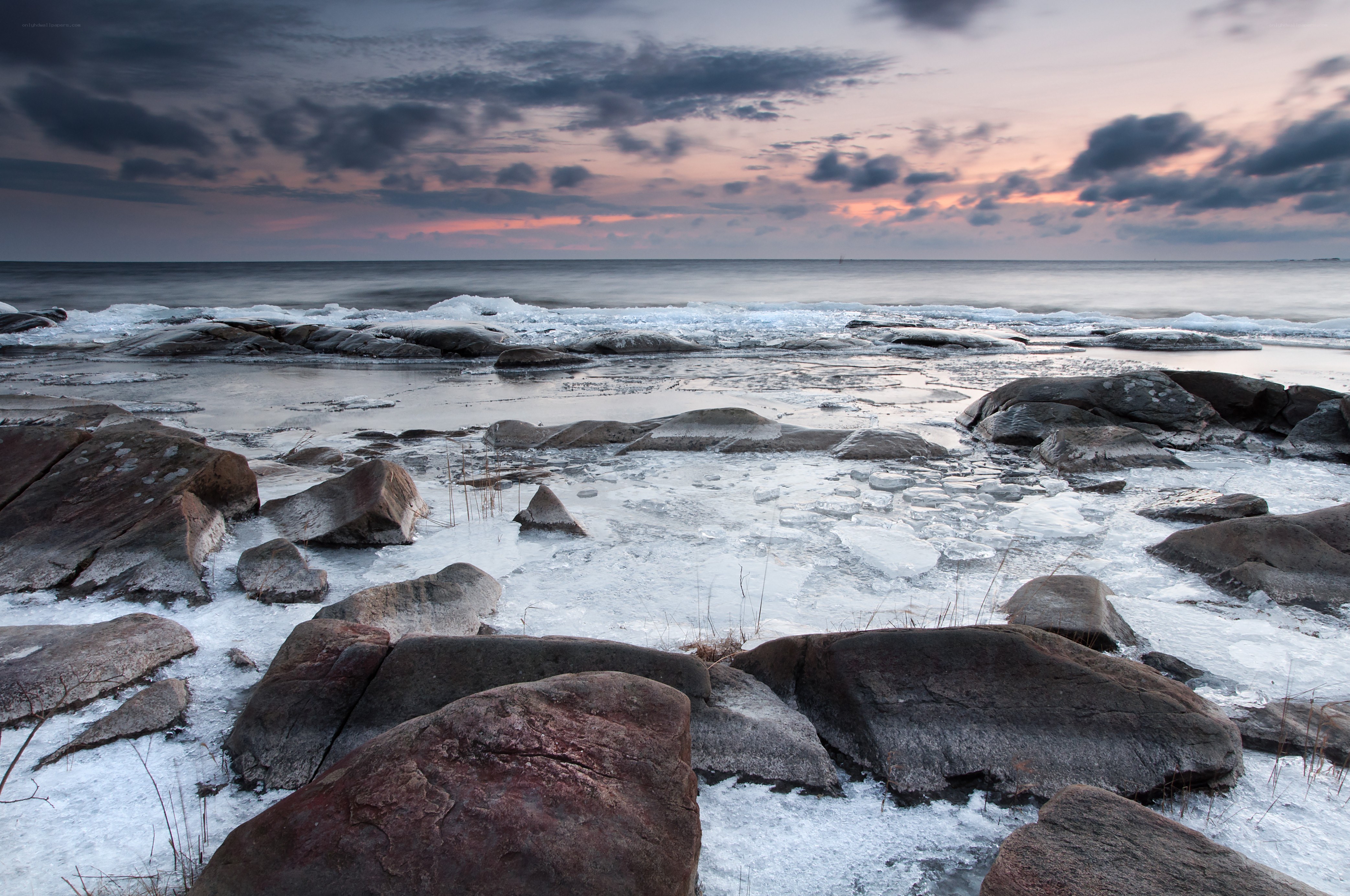Frozen coast at dusk