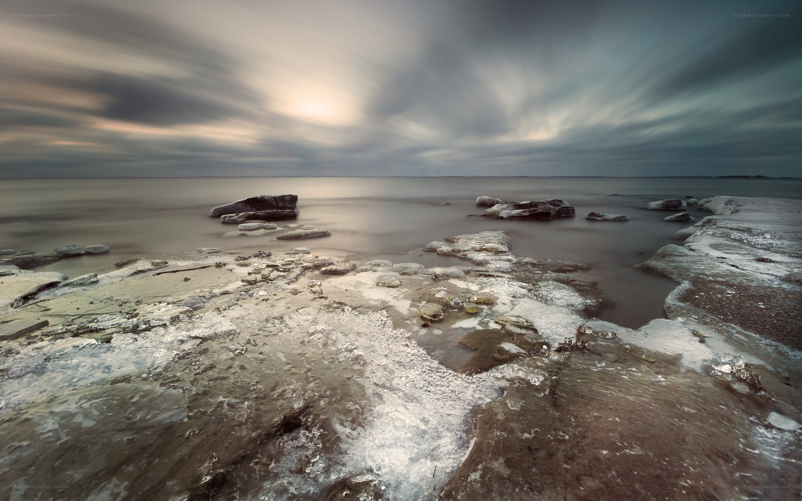 Frozen coastal landscape at dusk