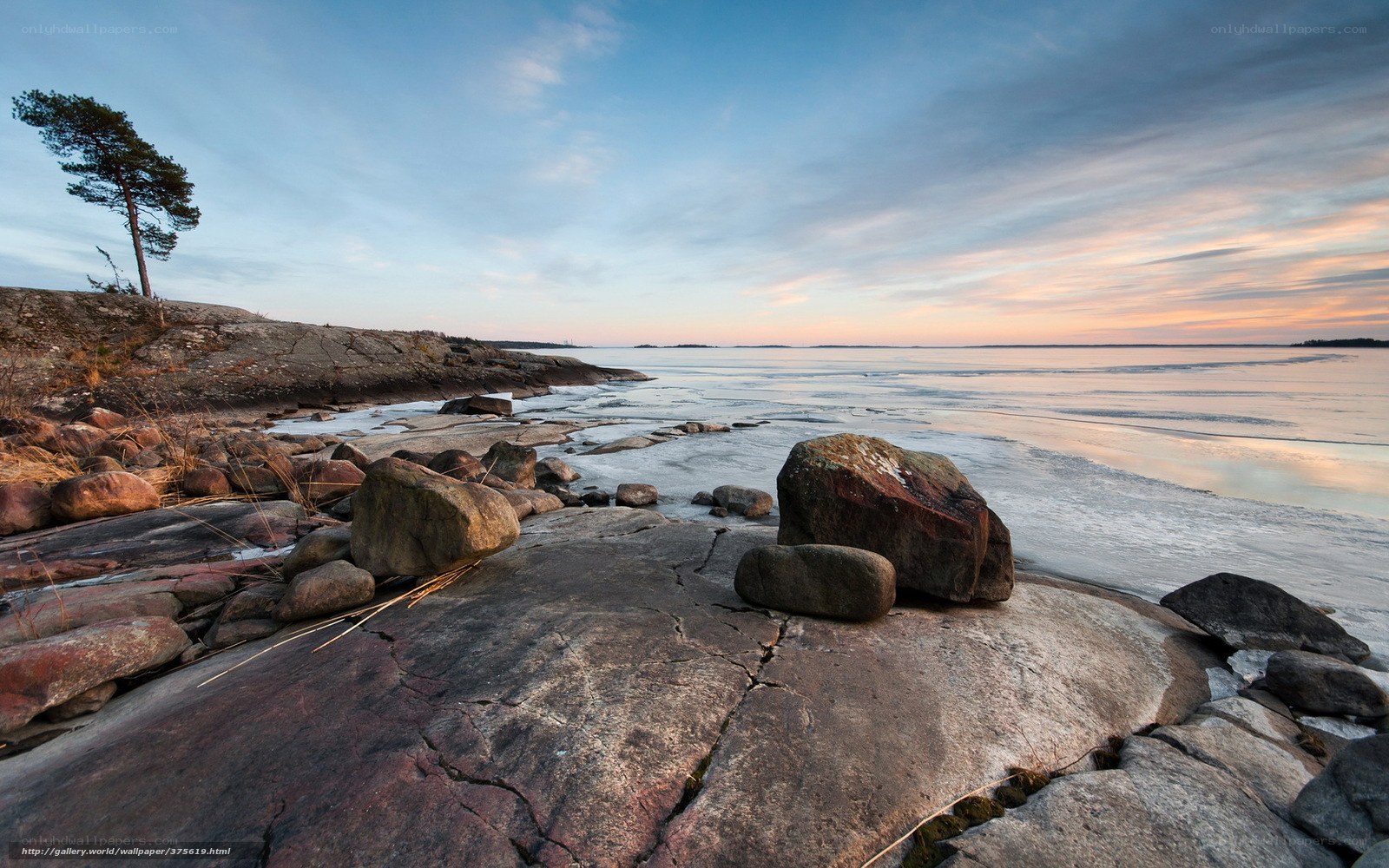 Frozen coastal landscape at sunset