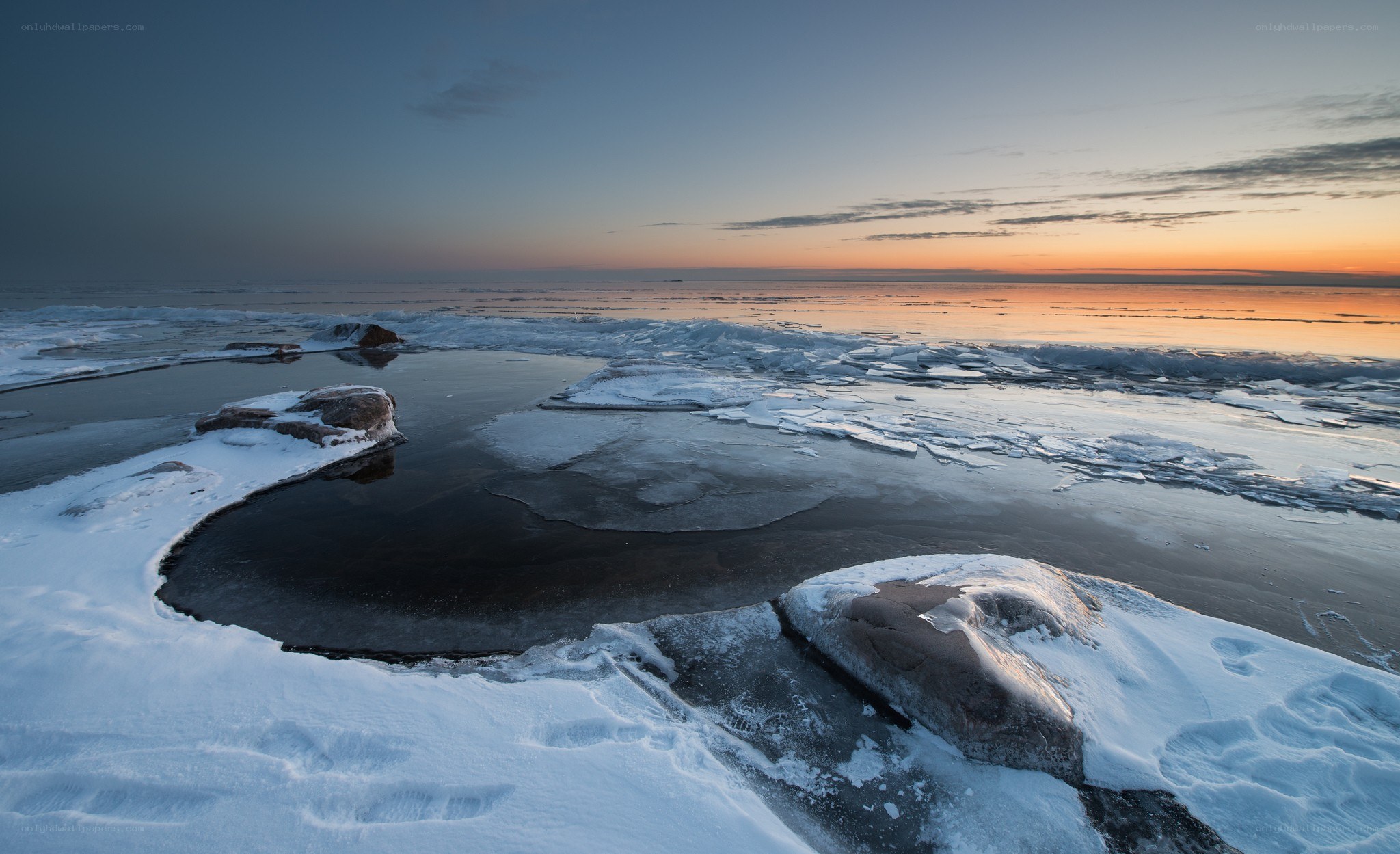 Frozen coastline at sunset