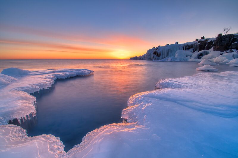 Frozen Coastline at Sunset — Blue, Serene
