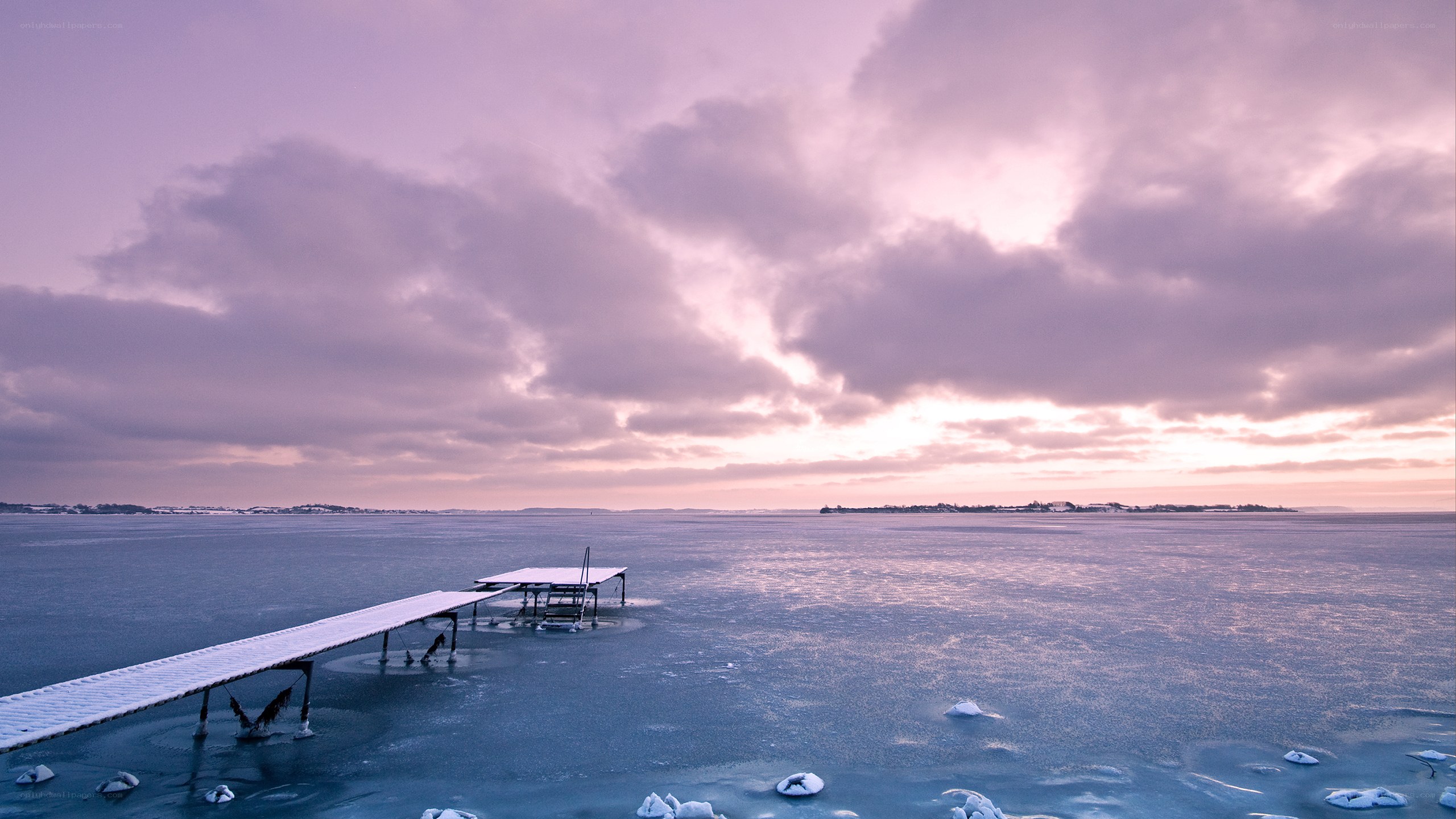 Frozen dock at sunset