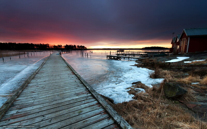 Frozen dock at sunset