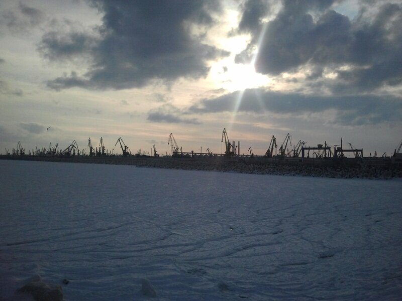Frozen Harbor at Sunset