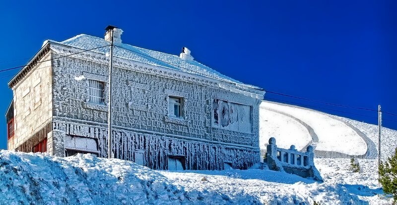 Frozen House in Snow