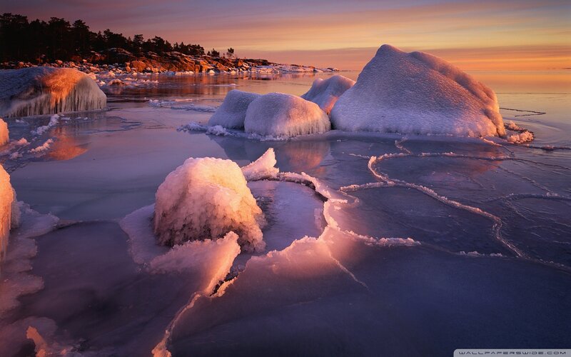 Frozen ice formations at sunset