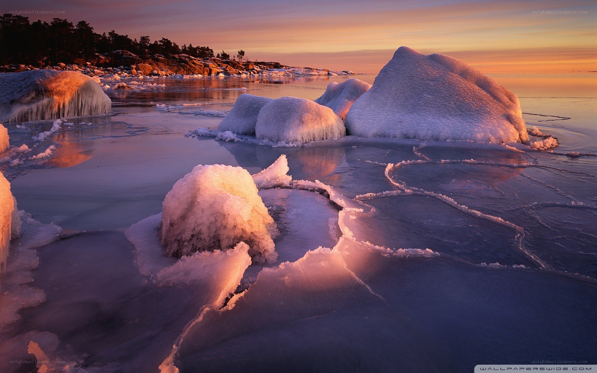 Frozen ice formations at sunset