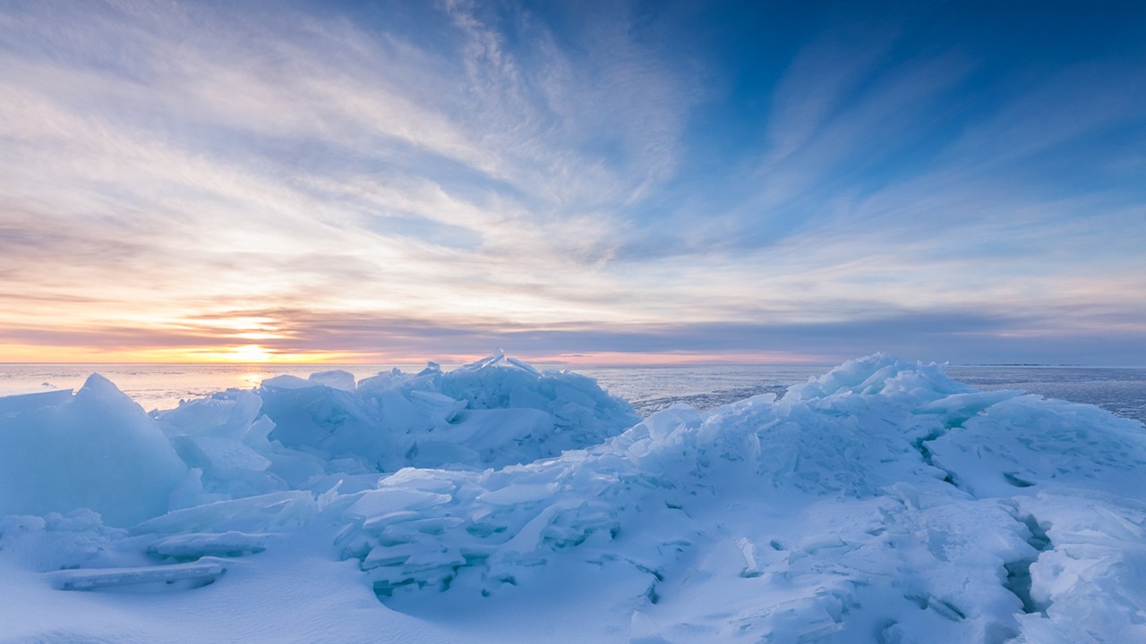 Frozen ice landscape at sunset