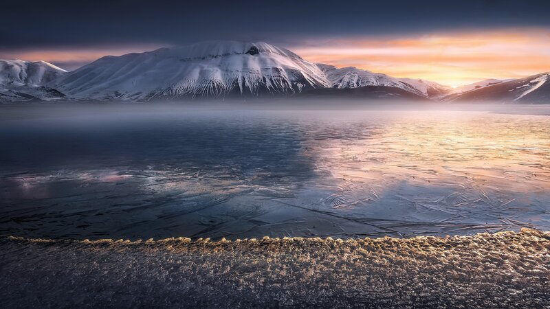 Frozen Lake and Snow-covered Mountains — Blue, Serene