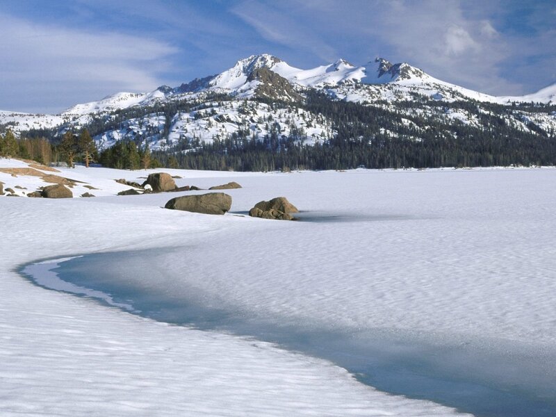Frozen Lake and Snow-covered Mountains