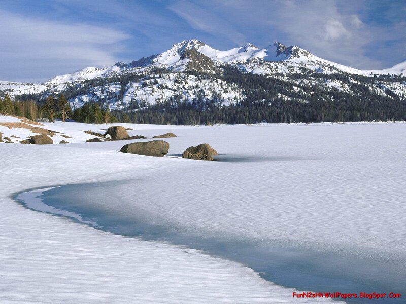 Frozen Lake and Snow-covered Mountains — White