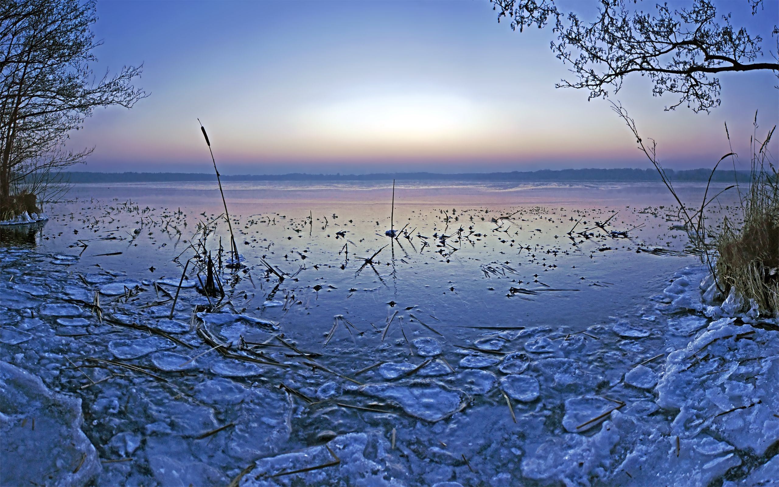 Frozen lake at dawn
