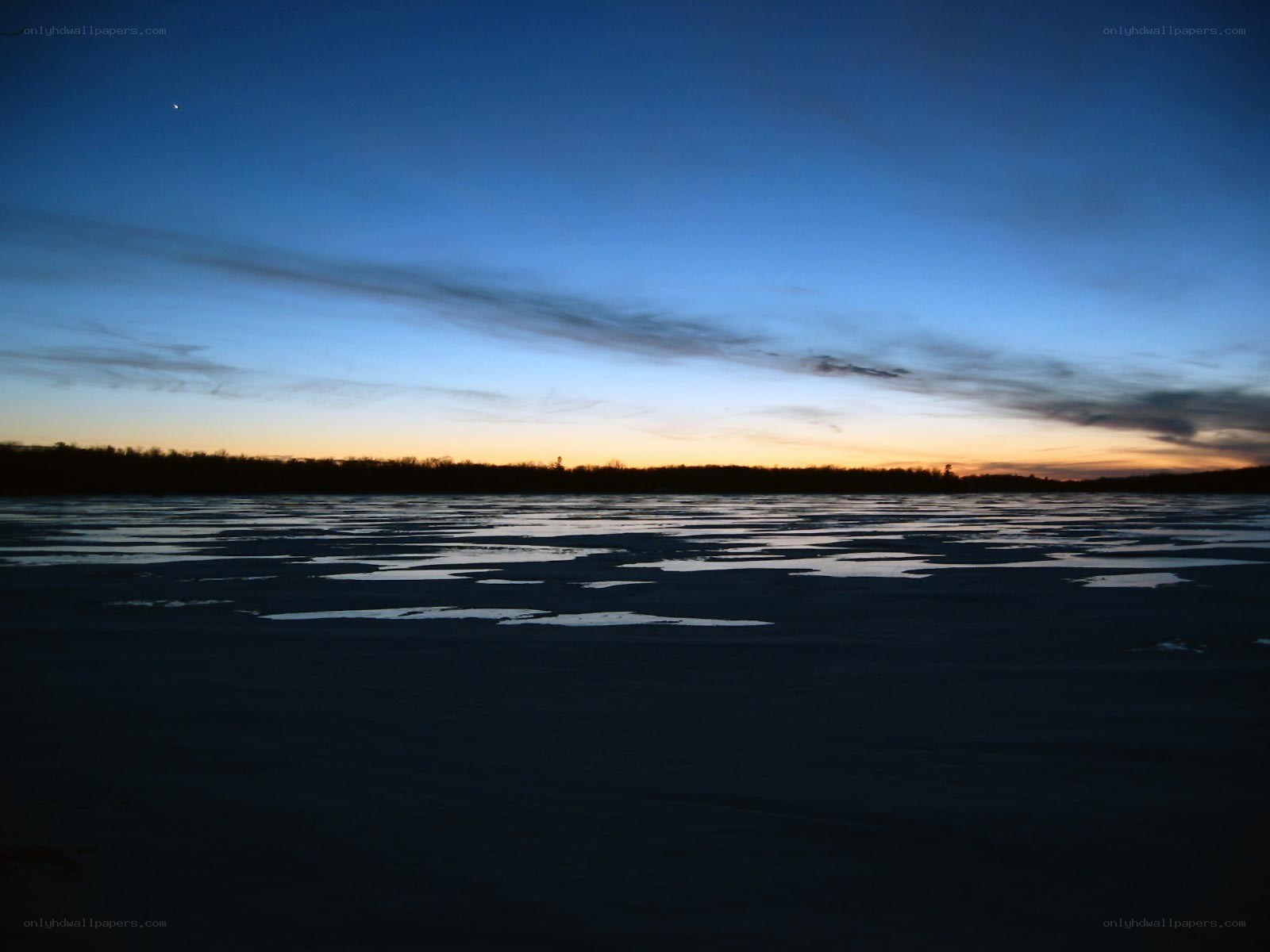 frozen lake at dusk
