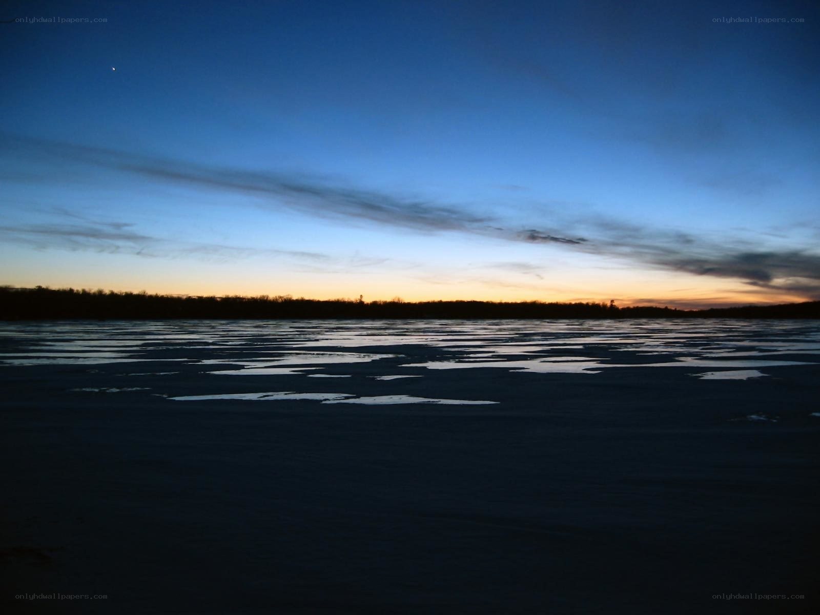 frozen lake at dusk