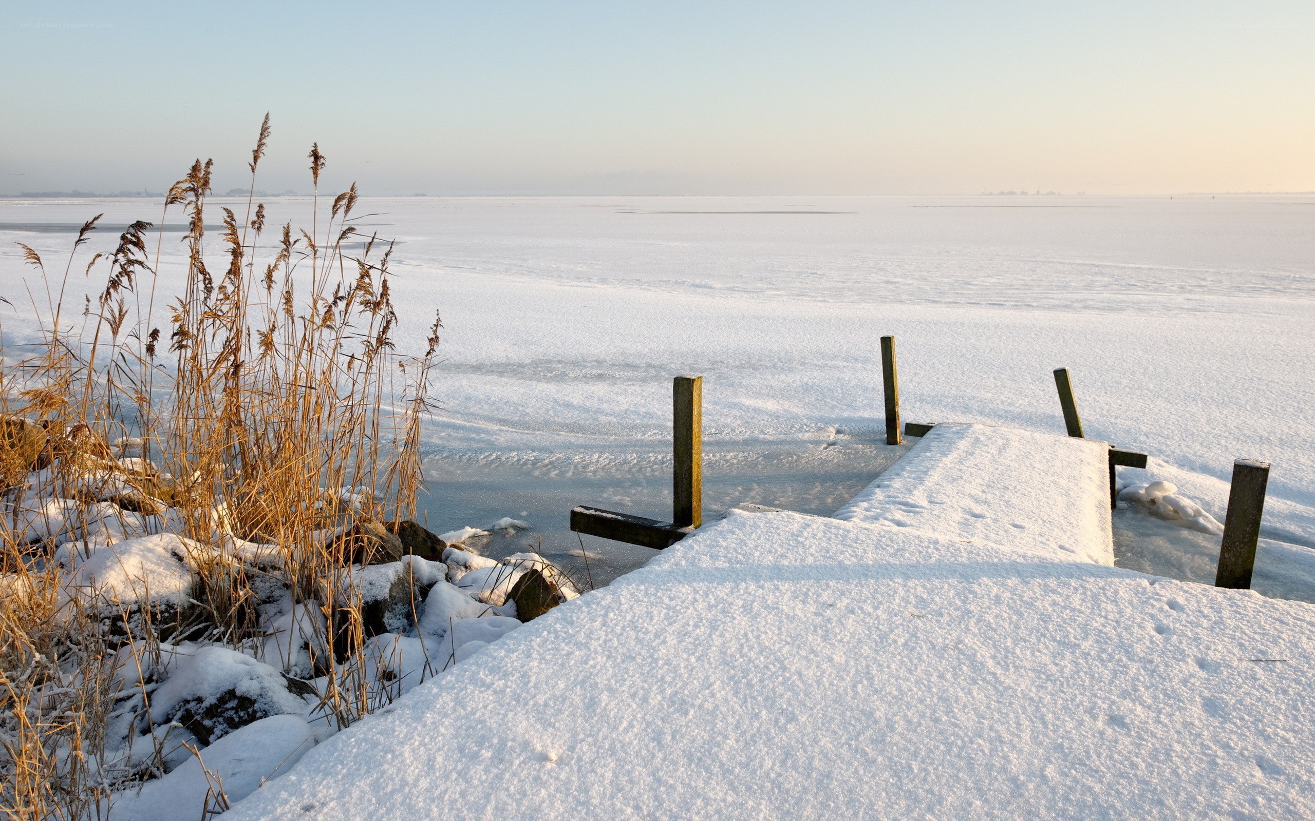 Frozen lake at sunrise