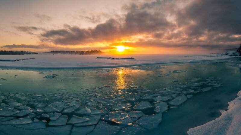 Frozen lake at sunset