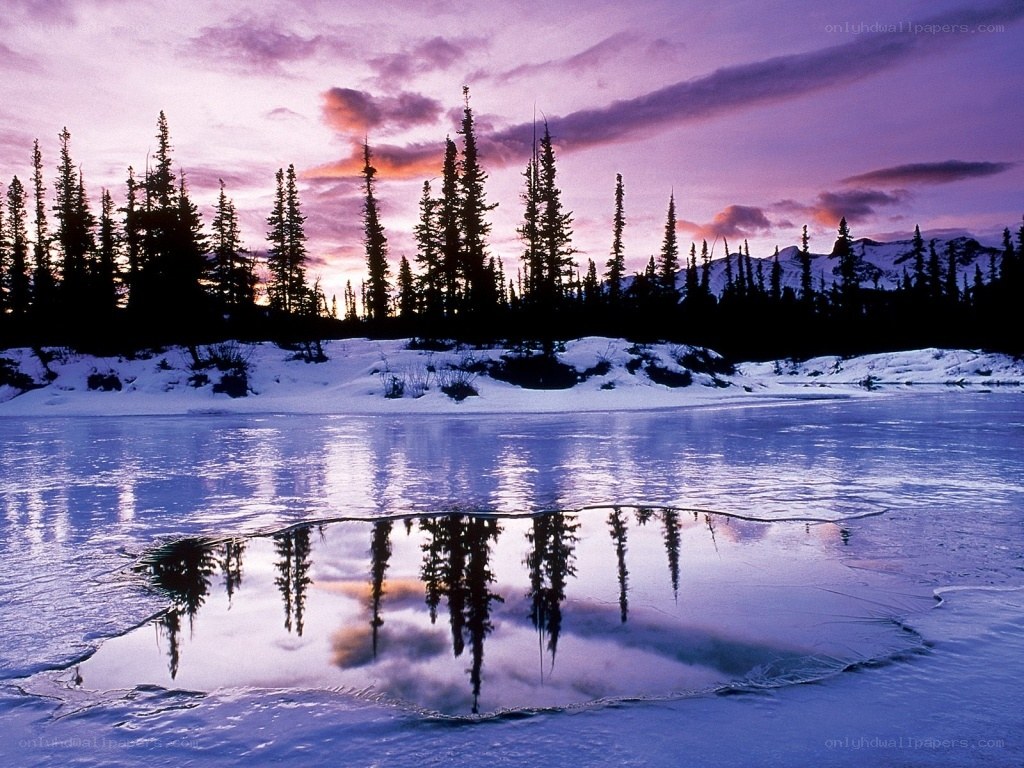 Frozen lake at sunset