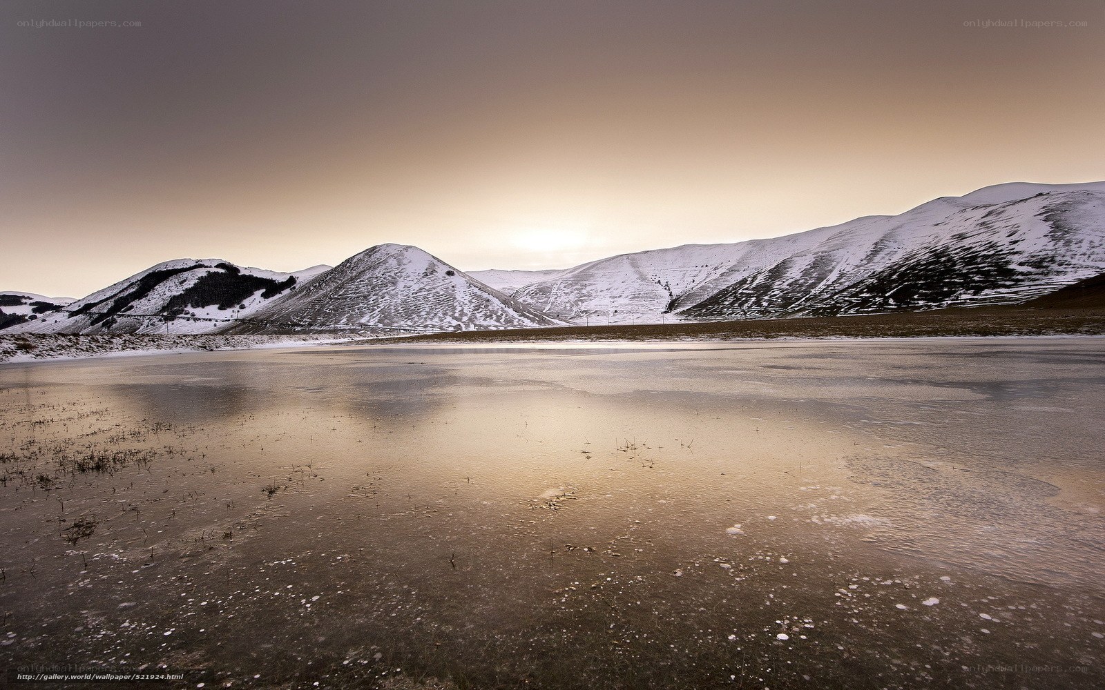 Frozen lake at sunset