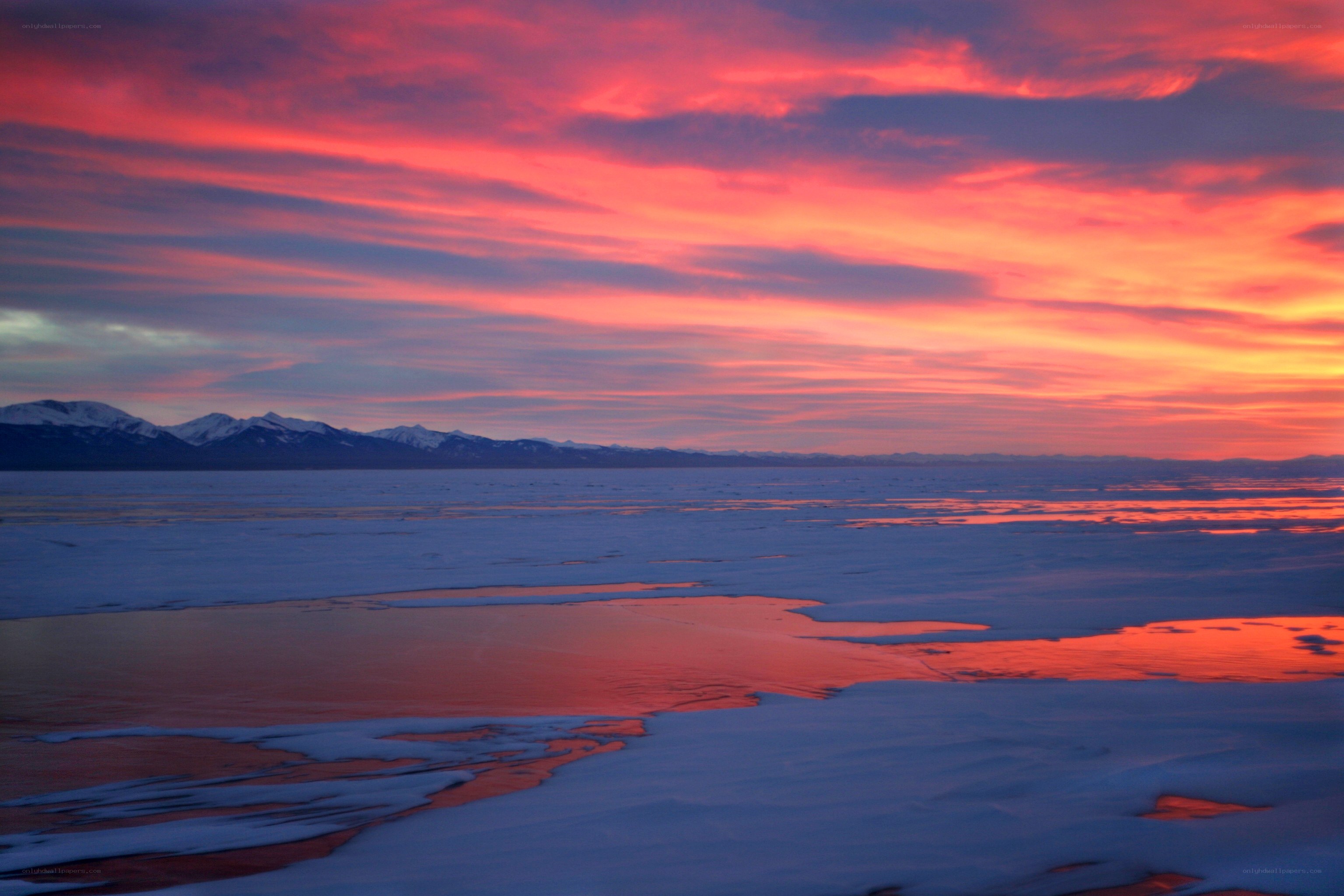 Frozen lake at sunset