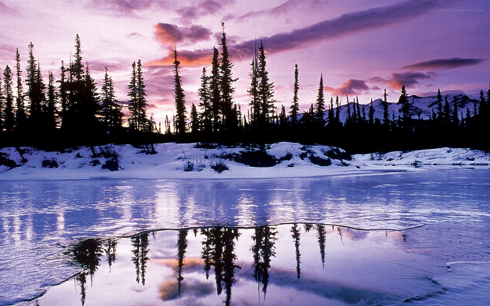 Frozen lake at sunset