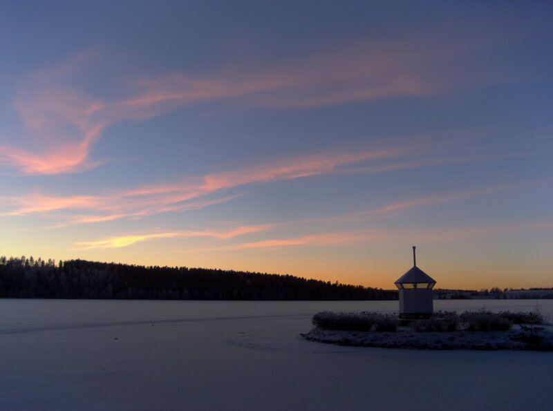 Frozen lake at sunset