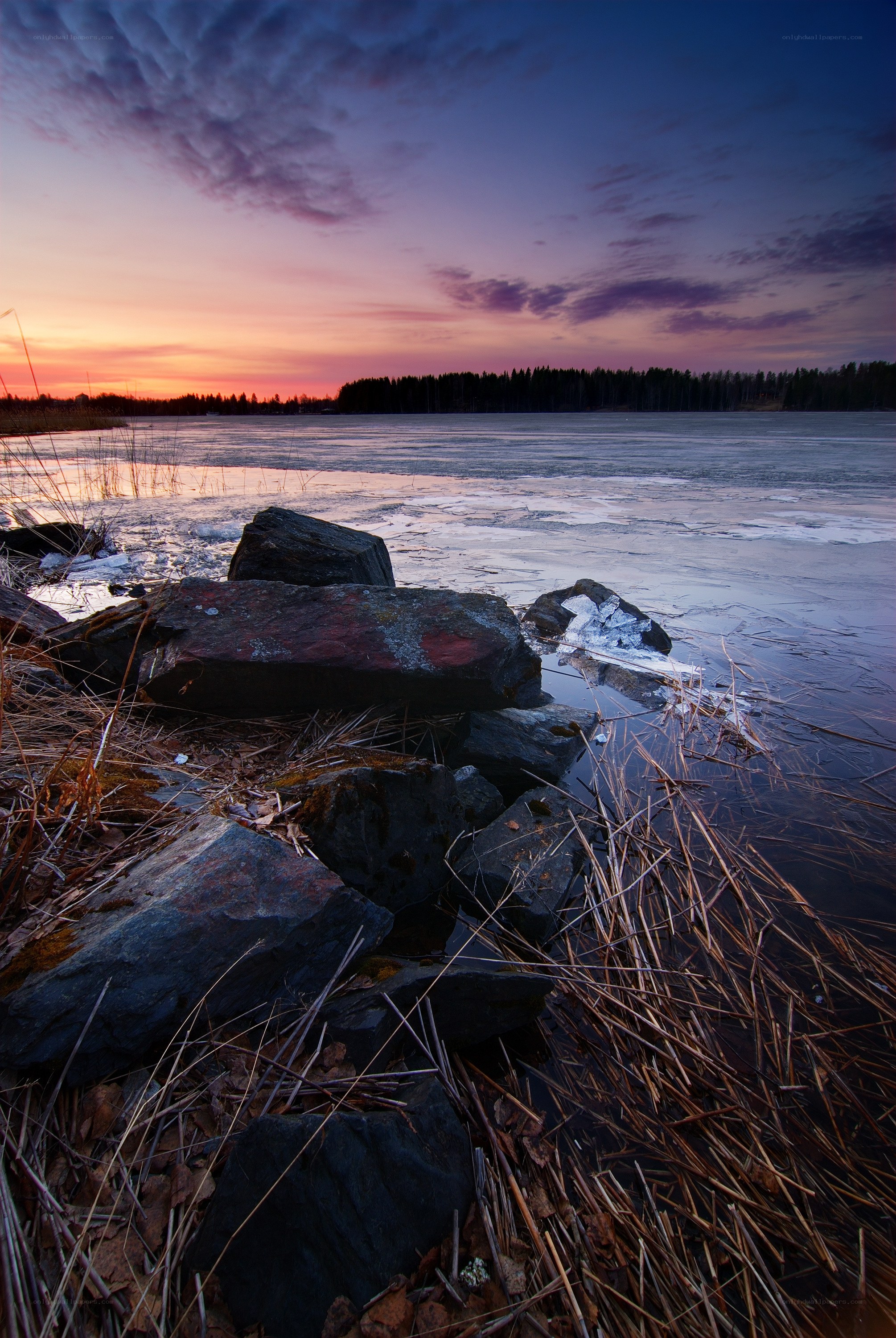 Frozen lake at sunset