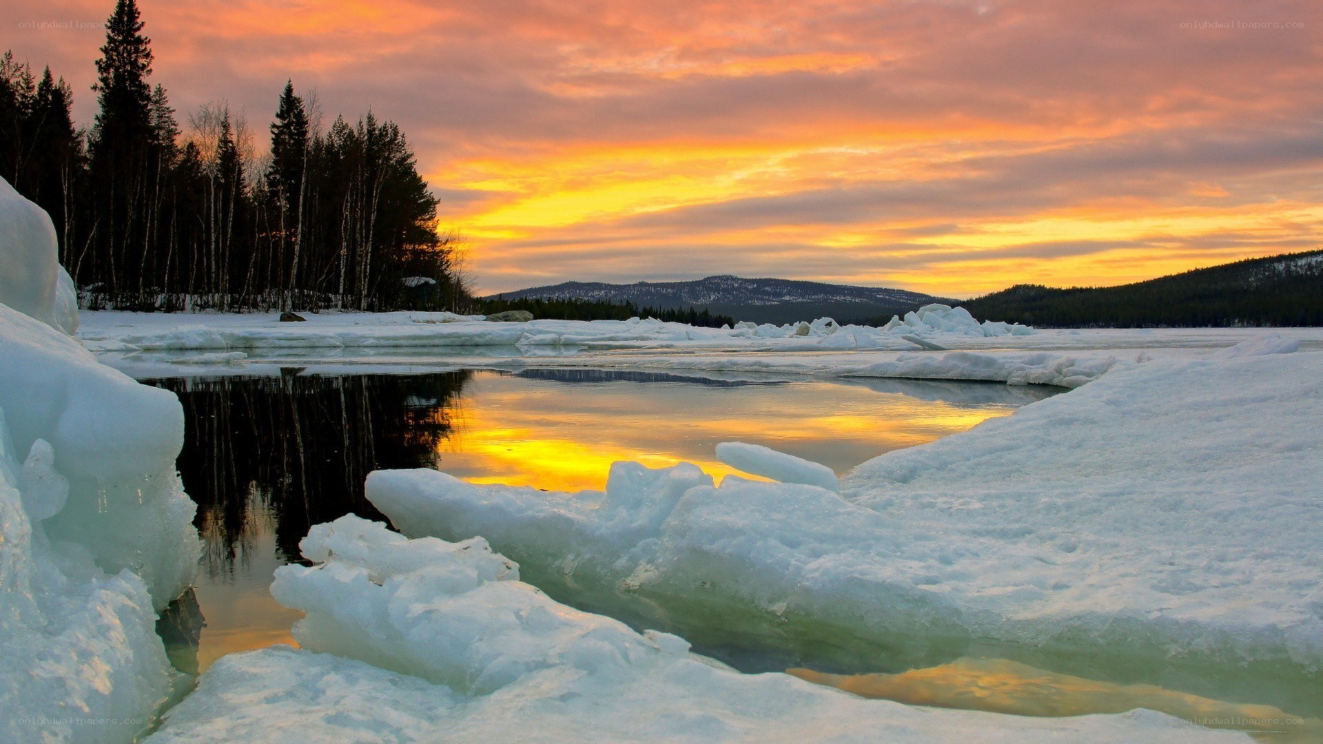 Frozen lake at sunset