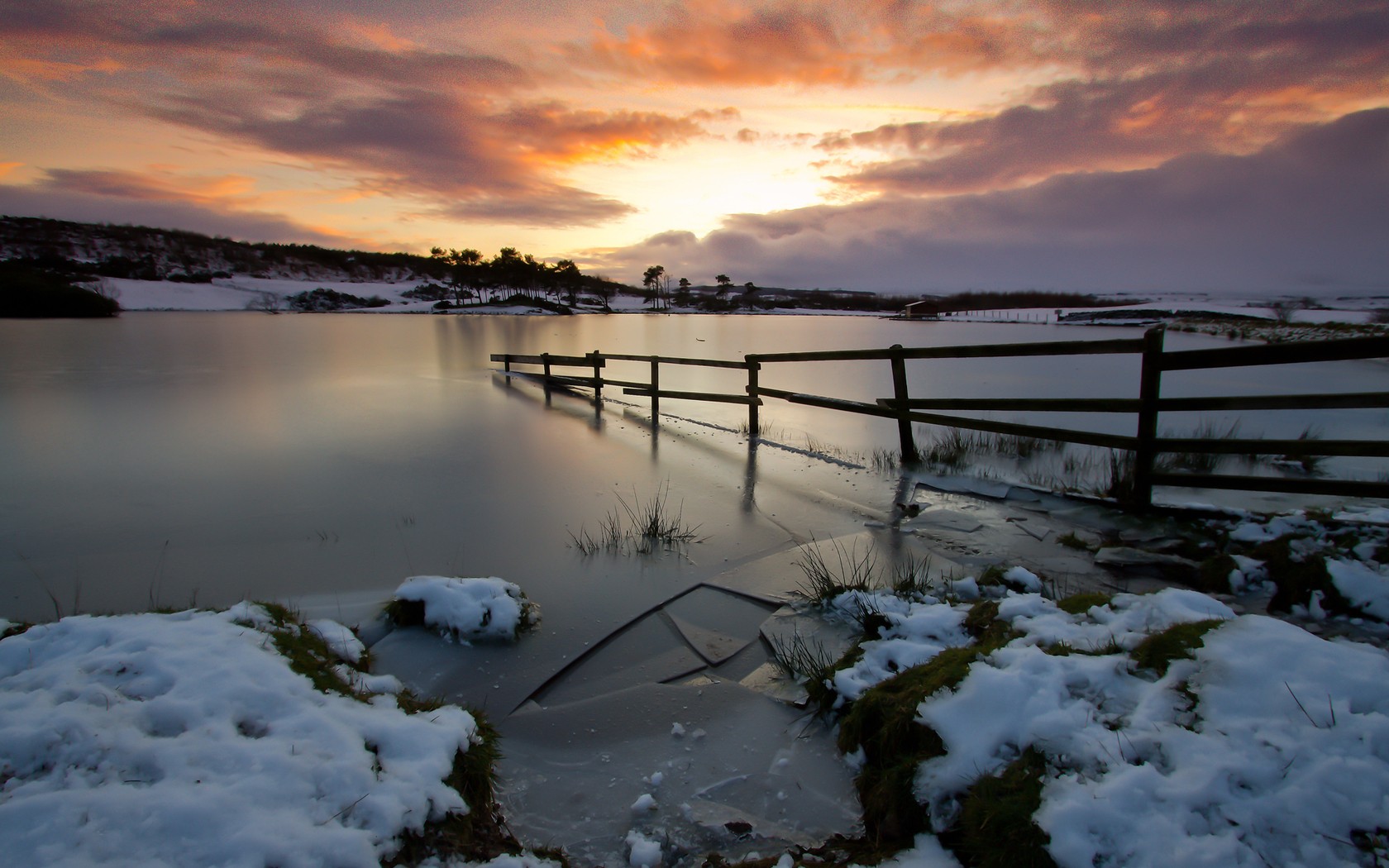 Frozen lake at sunset
