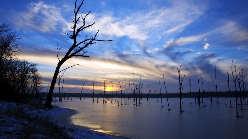 Frozen lake at sunset