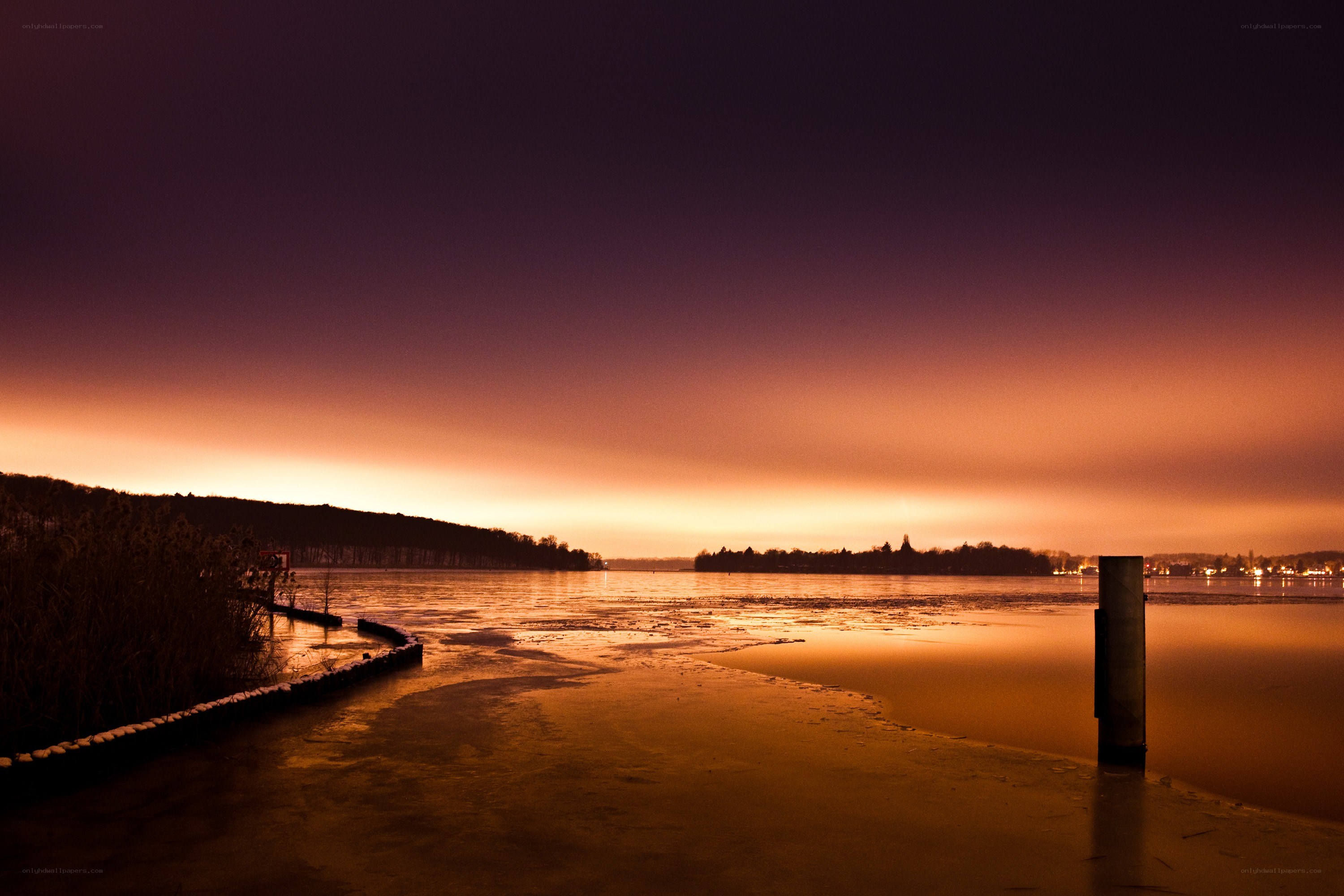 frozen lake at sunset