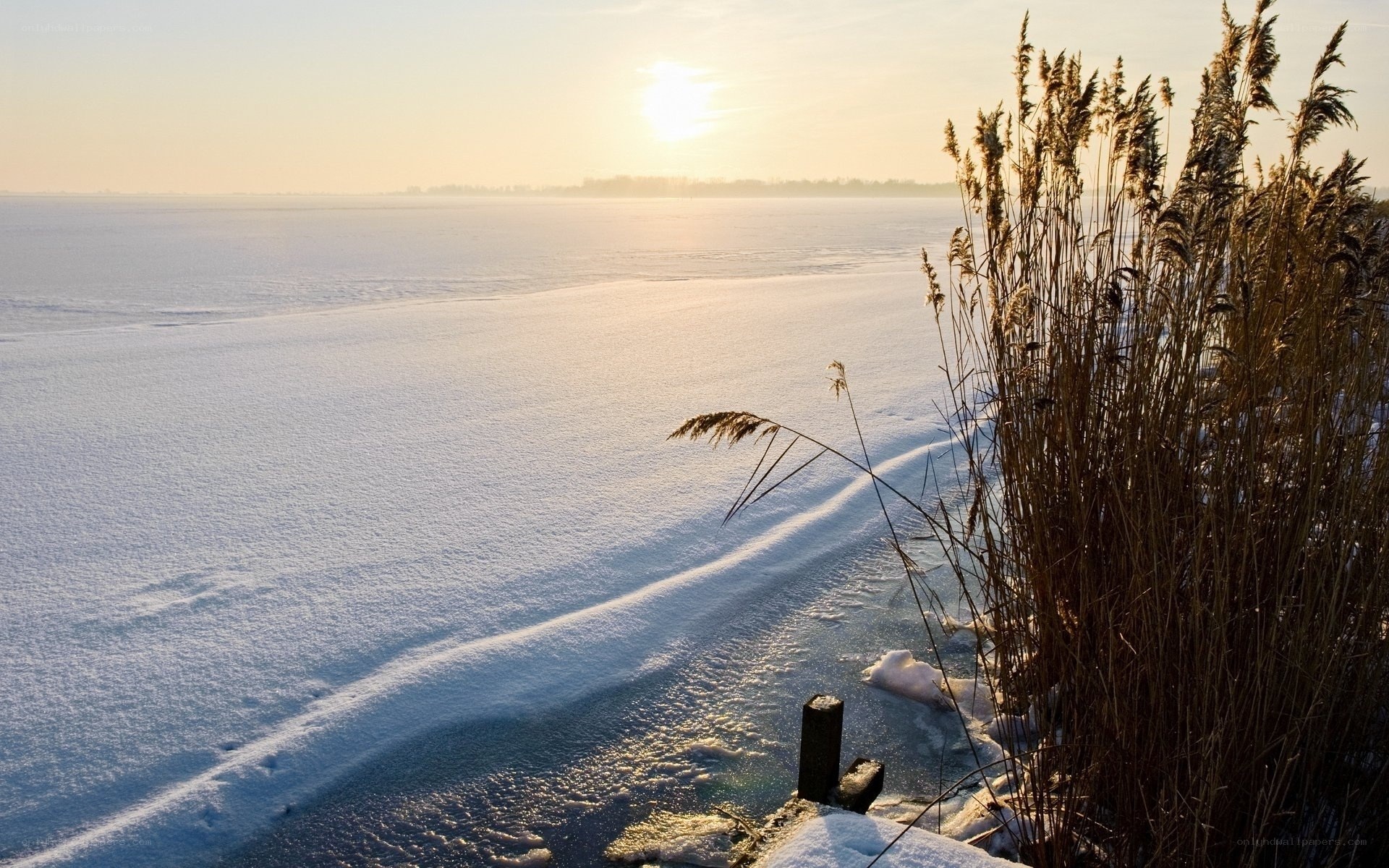 Frozen lake at sunset