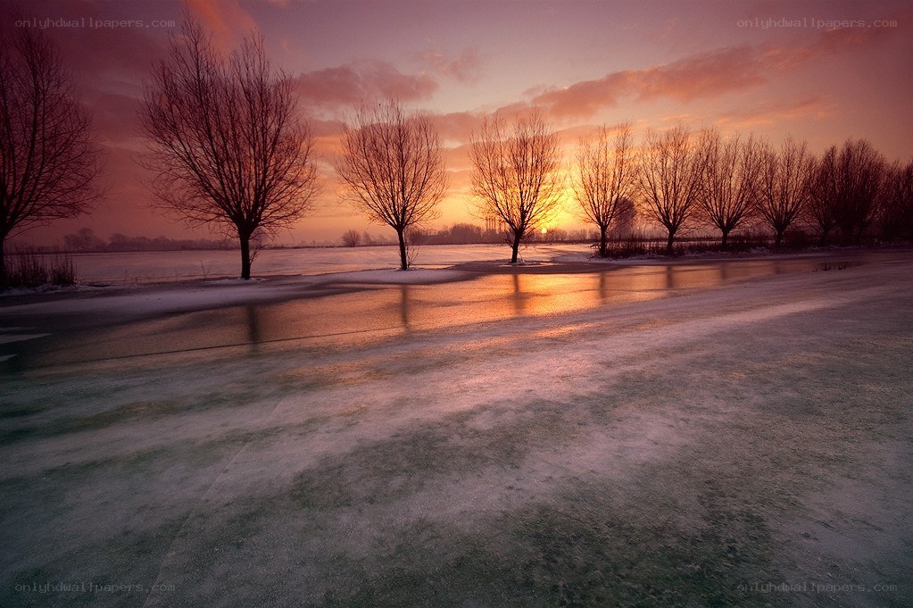 Frozen lake at sunset
