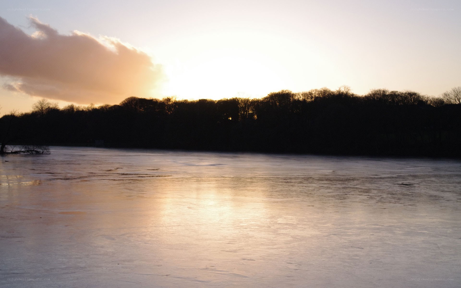 frozen lake at sunset