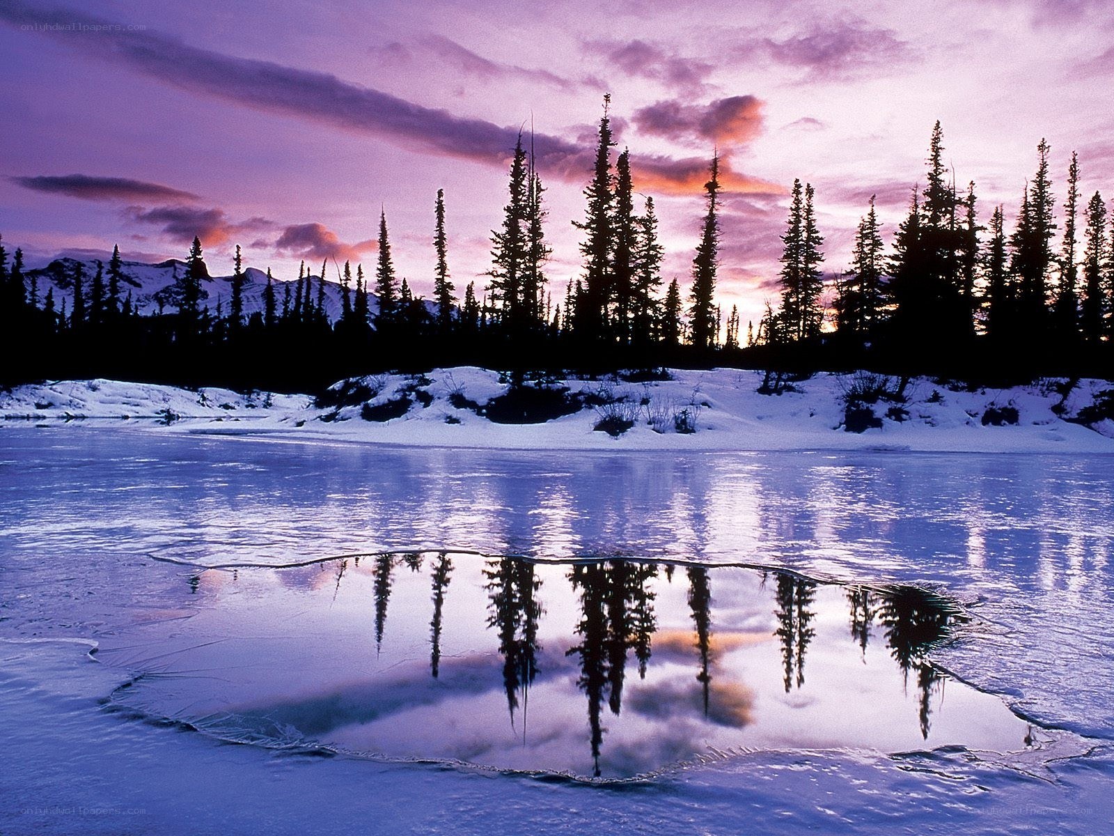Frozen lake at sunset