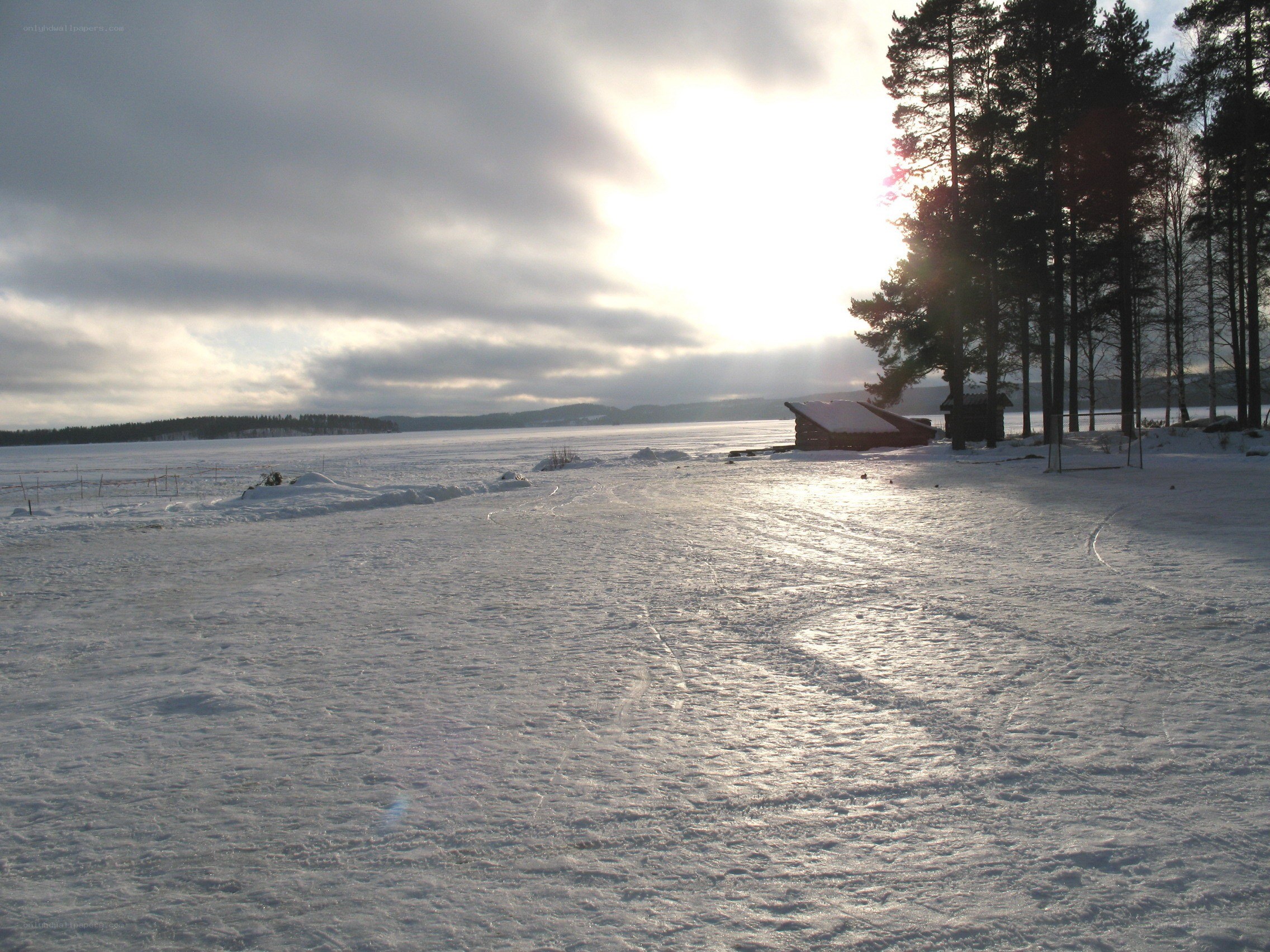 Frozen lake at sunset