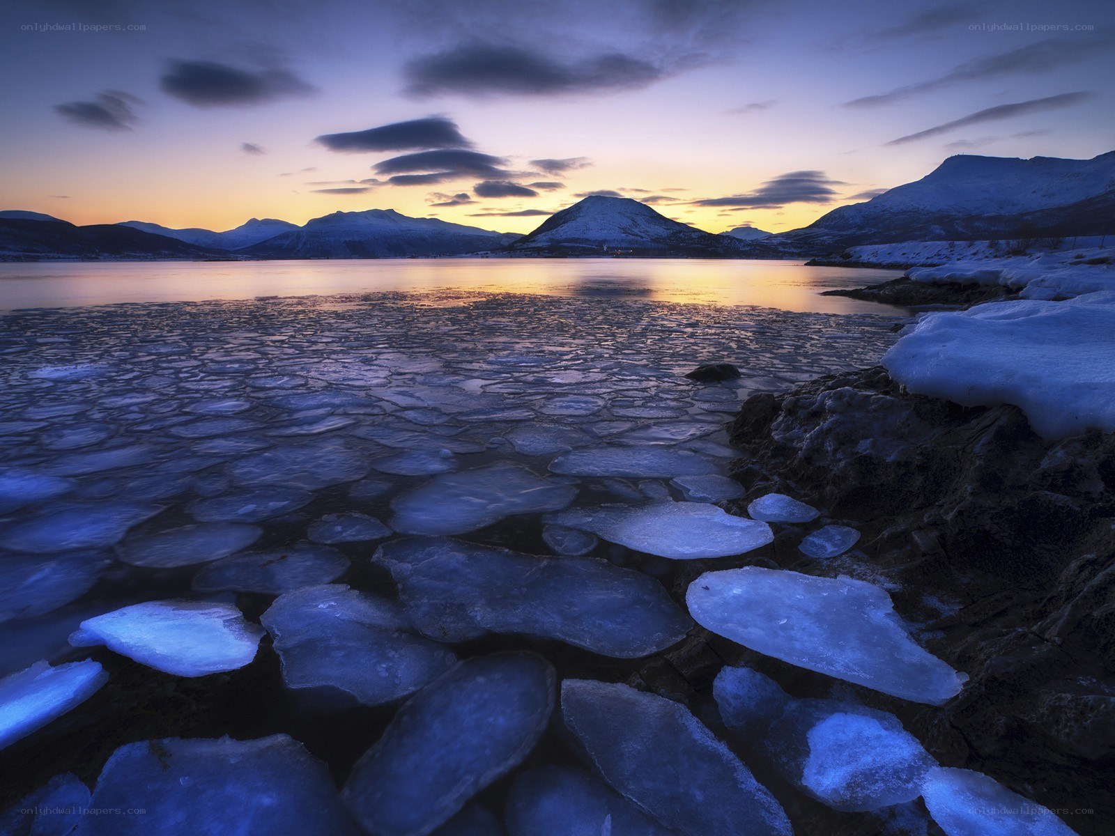 Frozen lake at sunset