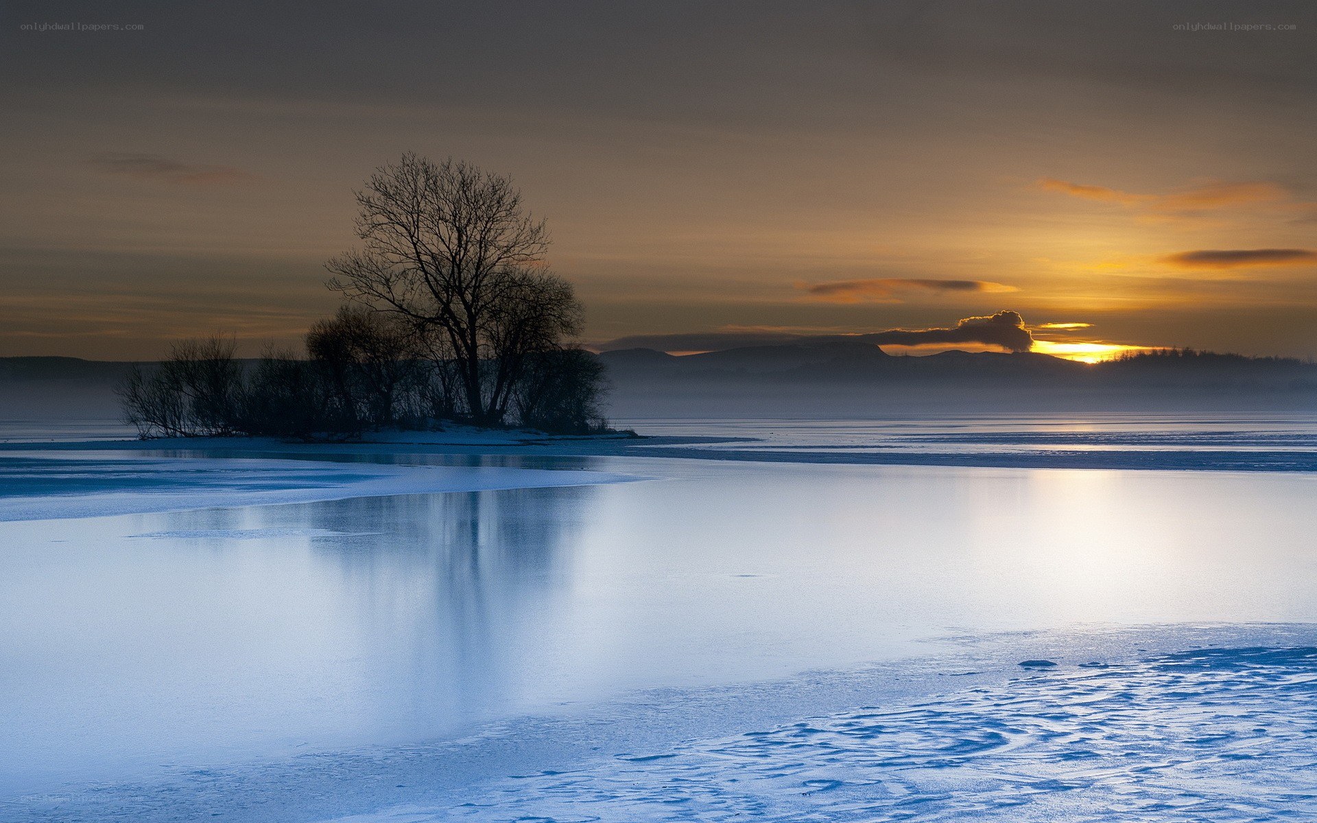 Frozen lake at sunset