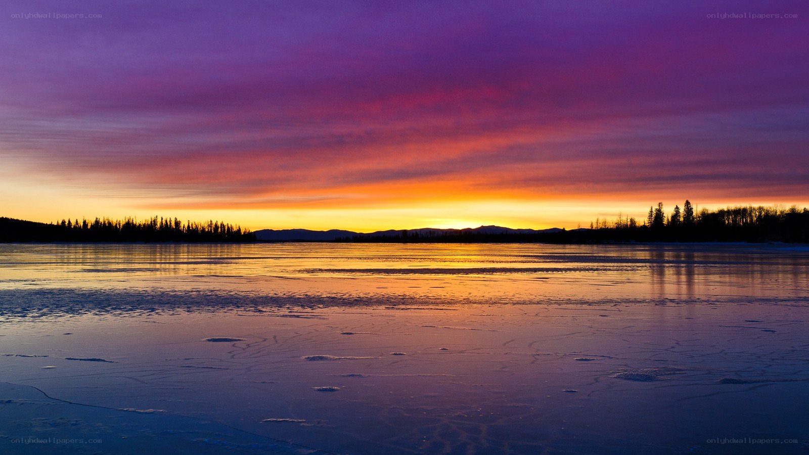 Frozen lake at sunset