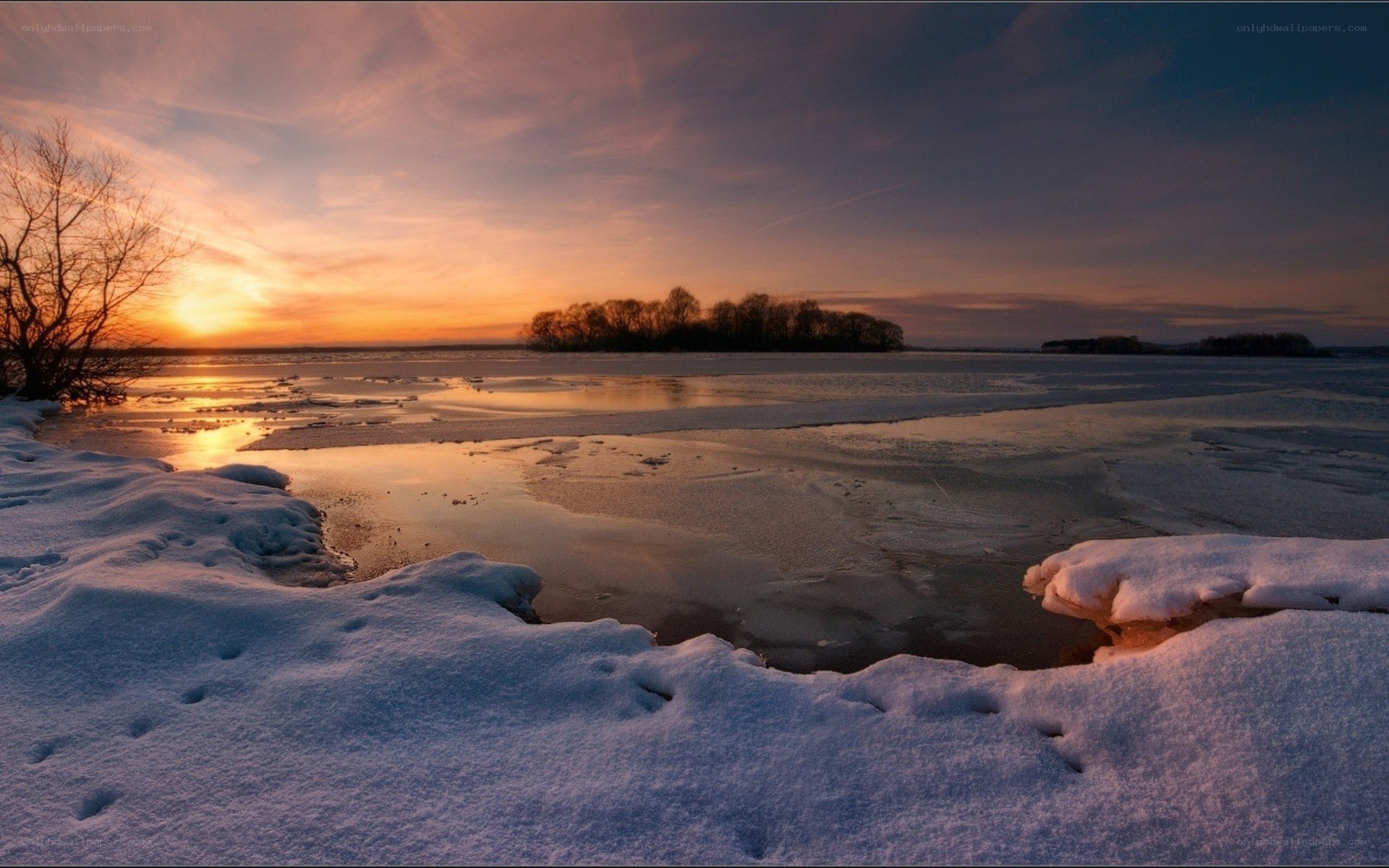 Frozen lake at sunset