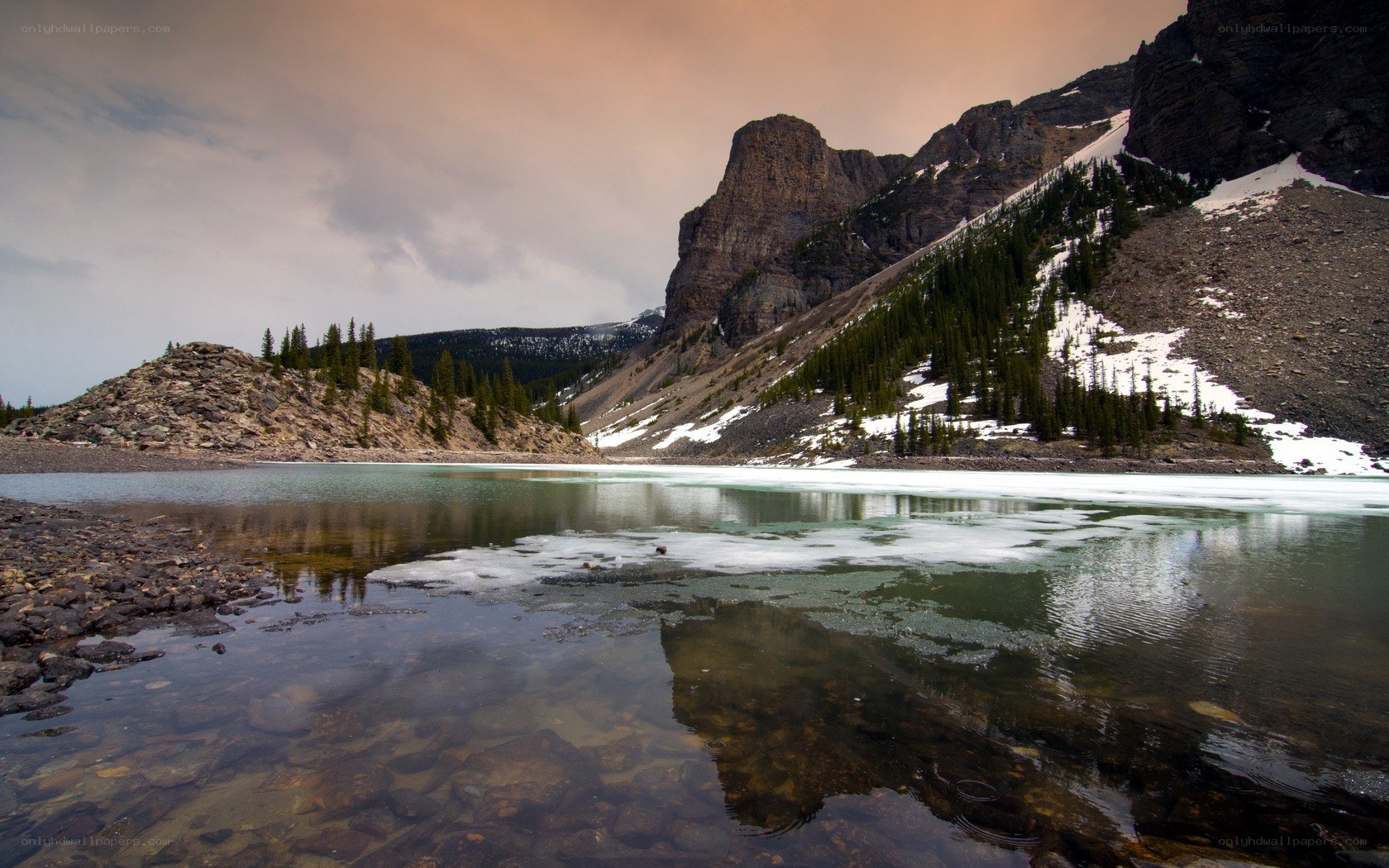 Frozen lake at sunset