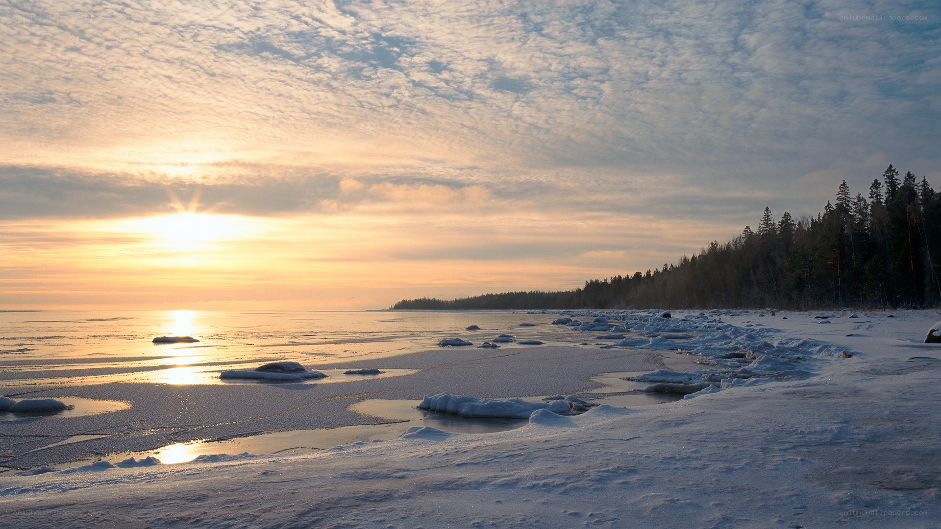 Frozen lake at sunset