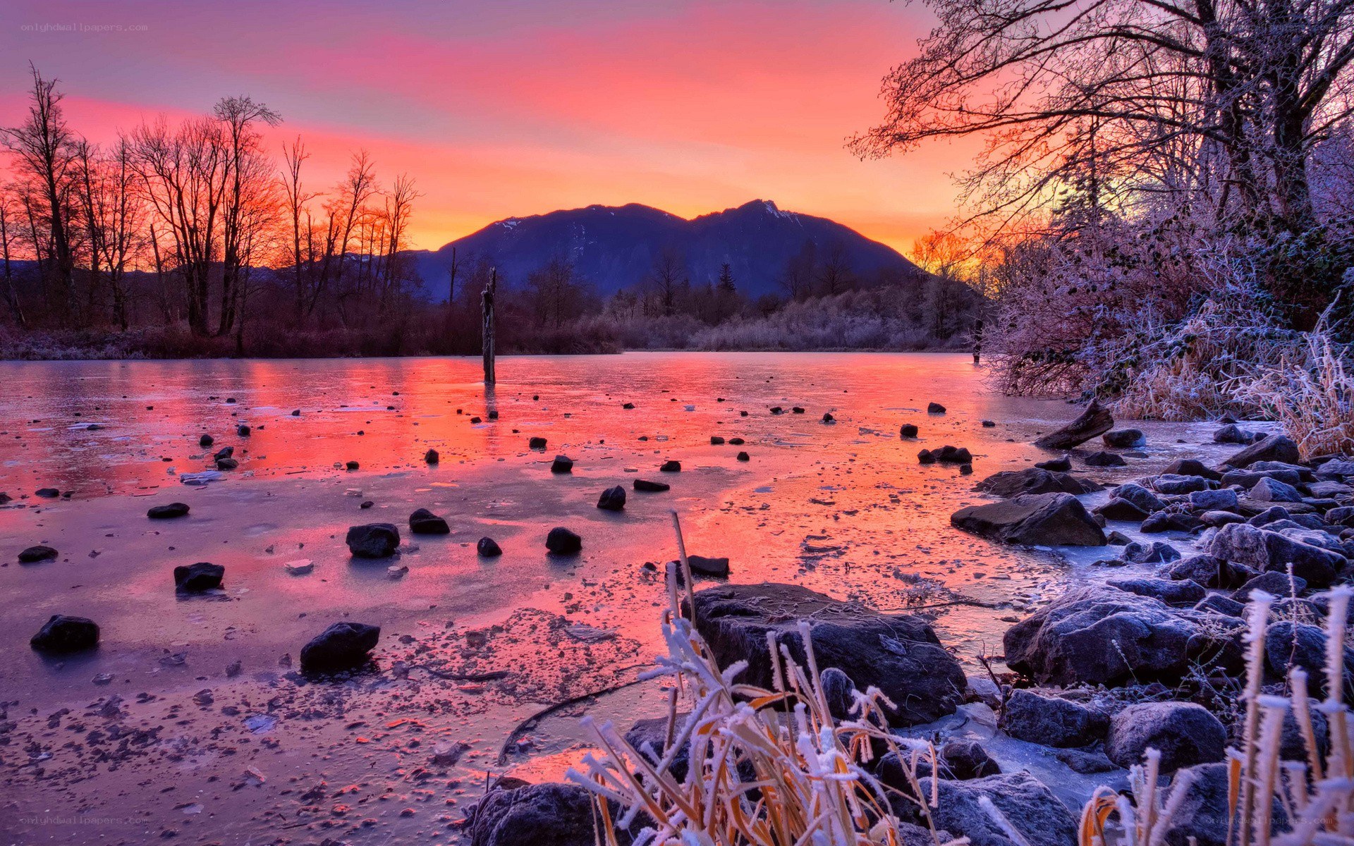 Frozen lake at sunset