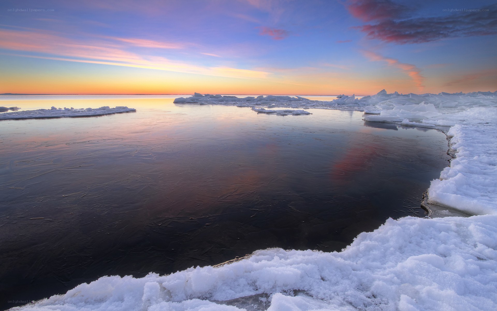 Frozen lake at sunset