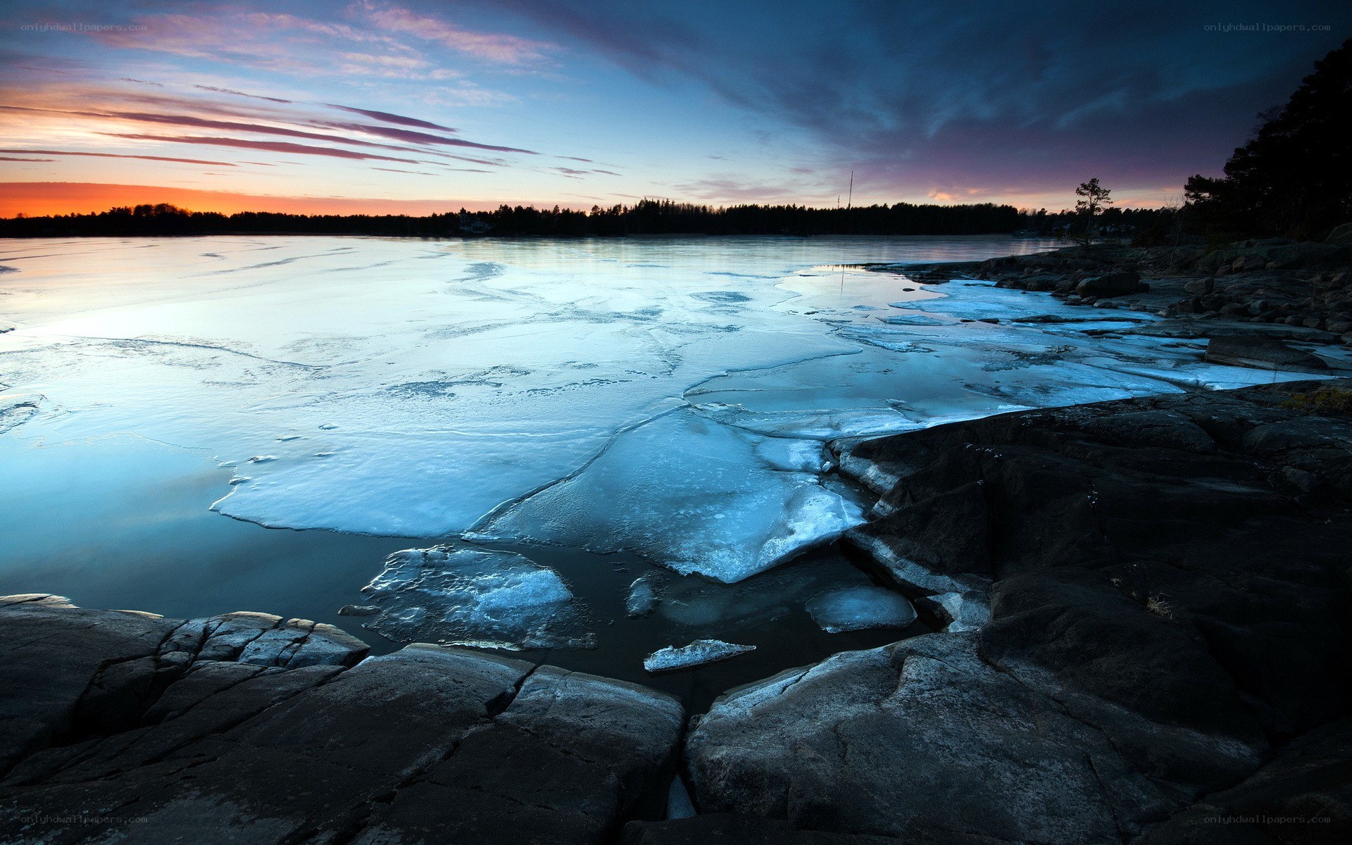 Frozen lake at sunset